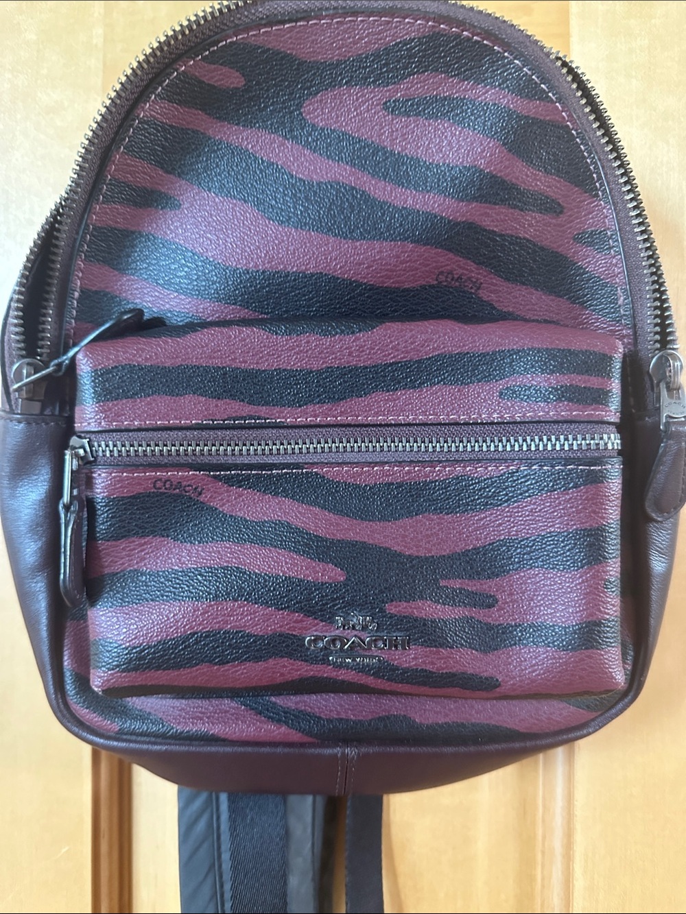 Coach Women’s purple and Black Zebra Print Leather Sling Bag
